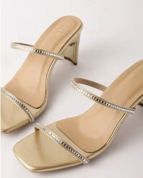 Beige heeled mules with crystal-trimmed straps